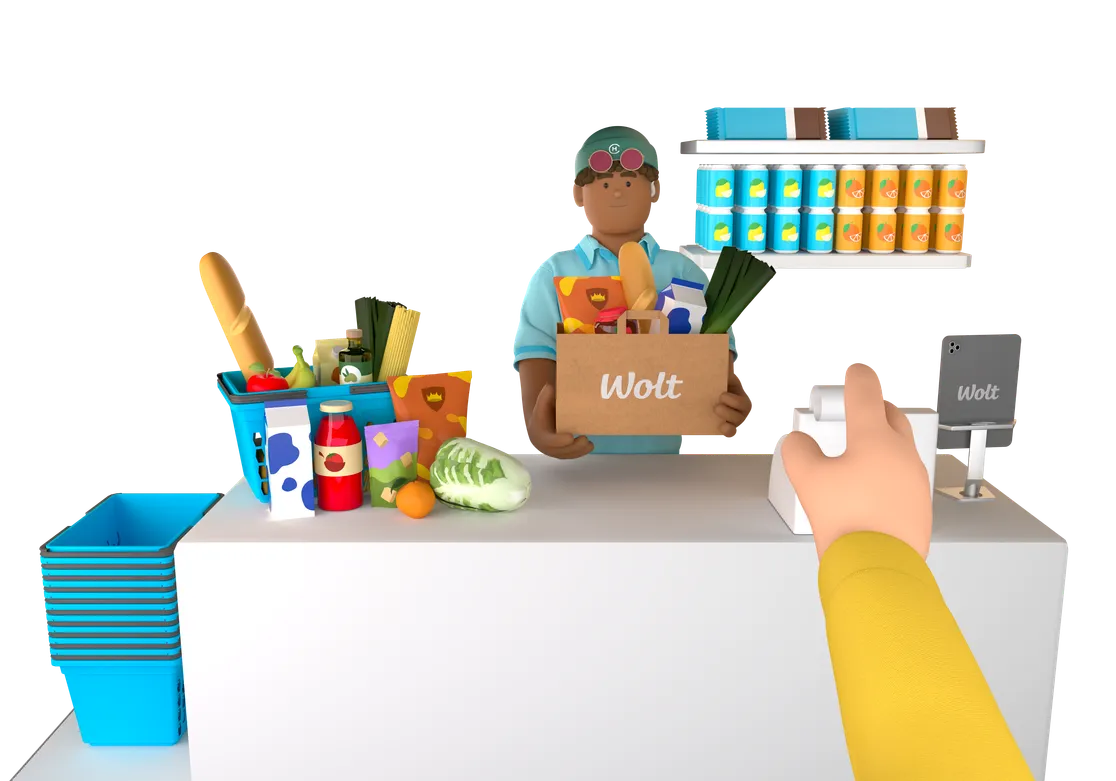 A Wolt merchant packing a grocery order at a shop counter